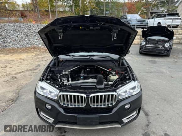 2018 BMW X5 xDrive35i z VIN 5UXKR0C55J0X97612, wystawiony jako Copart lot #90825495 z przebiegiem 219 562 mil mil oraz Czysty tytuł • Clean title. Historia ofert i sprzedaży dostępna na DreamBid. Obrazek 8.