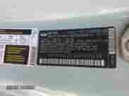 2011 MINI Hardtop with VIN WMWSU3C52BT096248, listed as a Copart auction lot 62008285 with 129,794 mi miles and Salvage title. Bid and sale history available at DreamBid. Image 13.