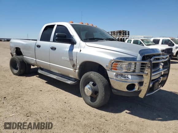 2004 Dodge 3500 SLT with VIN 3D7MU48614G158487, listed as a Copart auction lot 69199324 with 122,891 mi miles and Salvage title. Bid and sale history available at DreamBid. Image 4.