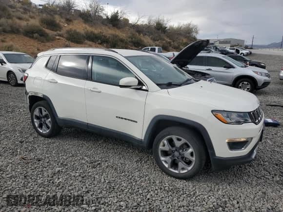 2020 Jeep Compass Limited with VIN 3C4NJDCB7LT221383, listed as a Copart auction lot 84047185 with 82,746 mi miles and Salvage title. Bid and sale history available at DreamBid. Image 4.