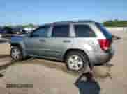 2007 Jeep Grand Cherokee Laredo with VIN 1J8GR48KX7C593322, listed as a Copart auction lot 71458485 with 166,252 mi miles and Salvage title. Bid and sale history available at DreamBid. Image 2.