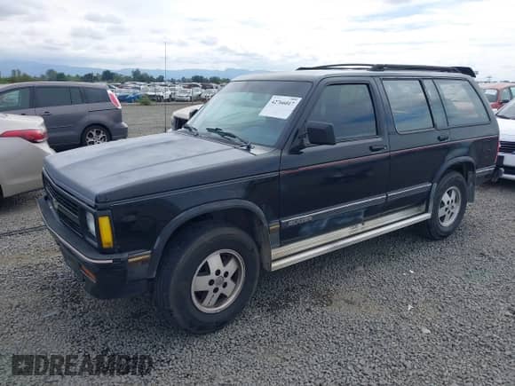 1992 Chevrolet Blazer z VIN 1GNDT13W4N2177782, wystawiony jako IAAI lot #42766017 z przebiegiem 165 544 mil mil oraz . Historia ofert i sprzedaży dostępna na DreamBid. Obrazek 17.
