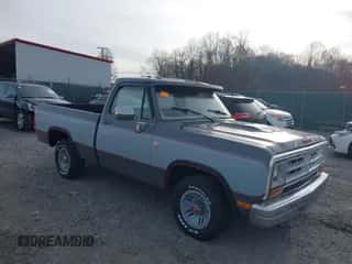1988 Dodge D/W 100 with VIN 1B7FD04X9JS676023, listed as a IAAI auction lot 40746708 with 98,215 mi miles and . Bid and sale history available at DreamBid. Image 1.