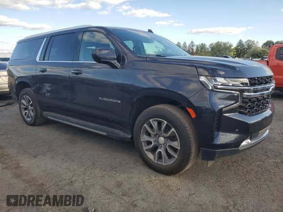 2022 Chevrolet Suburban LS z VIN 1GNSKBKD2NR358256, wystawiony jako Copart lot #85908235 z przebiegiem 96 388 mil mil oraz Czysty tytuł • Clean title. Historia ofert i sprzedaży dostępna na DreamBid. Obrazek 4.