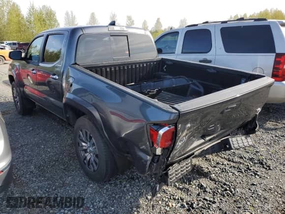 2022 Toyota Tacoma Limited with VIN 3TMGZ5AN4NM528267, listed as a Copart auction lot 52534795 with 40,559 mi miles and Salvage title. Bid and sale history available at DreamBid. Image 2.
