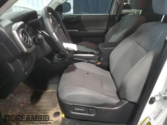 2023 Toyota Tacoma SR5 with VIN 3TYAZ5CN2PT042244, listed as a Copart auction lot 76022534 with 9,551 mi miles and Salvage title. Bid and sale history available at DreamBid. Image 7.