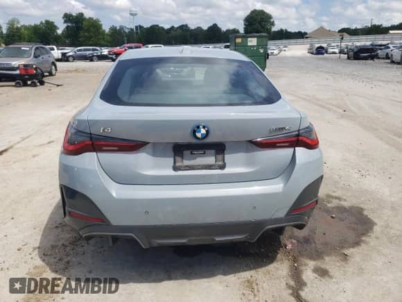 2022 BMW i4 eDrive40 with VIN WBY73AW02NFN19184, listed as a Copart auction lot 65177855 with 51,273 mi miles and Salvage title. Bid and sale history available at DreamBid. Image 6.