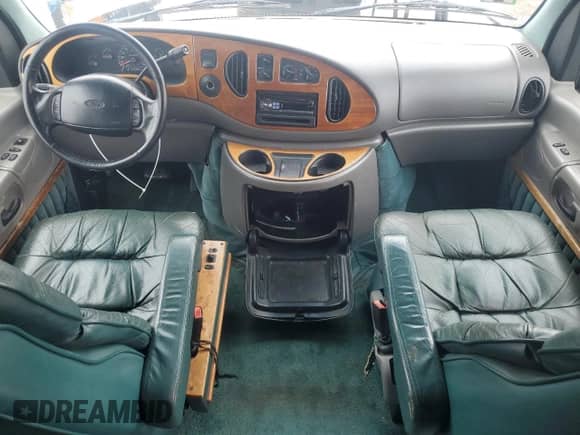 1999 Ford Econoline Cargo Recreational with VIN 1FDRE14L3XHA31771, listed as a Copart auction lot 49973795 with 220,268 mi miles and Salvage title. Bid and sale history available at DreamBid. Image 8.