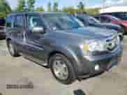 2010 Honda Pilot Touring with VIN 5FNYF4H9XAB005981, listed as a Copart auction lot 71617615 with 183,441 mi miles and Salvage title. Bid and sale history available at DreamBid. Image 4.