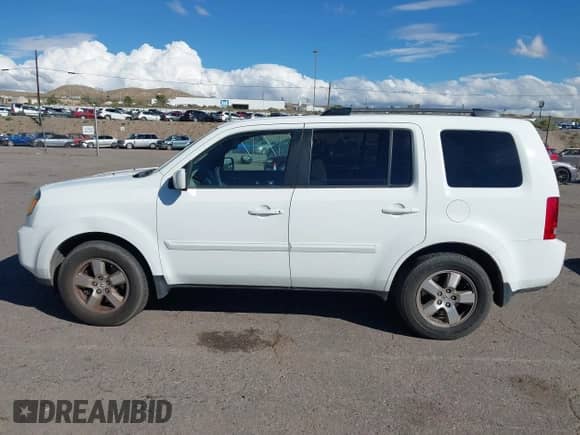 2011 Honda Pilot EX with VIN 5FNYF3H40BB016584, listed as a IAAI auction lot 43366677 with 234,469 mi miles and . Bid and sale history available at DreamBid. Image 14.