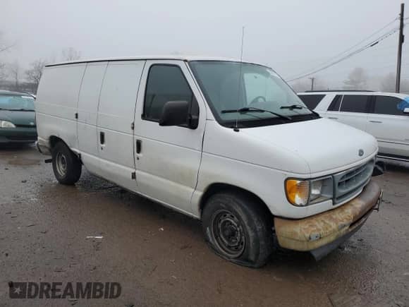 2001 Ford Econoline Cargo z VIN 1FTRE142X1HB27593, wystawiony jako Copart lot #83827154 z przebiegiem 190 761 mil mil oraz Szkoda całkowita • Salvage title. Historia ofert i sprzedaży dostępna na DreamBid. Obrazek 4.