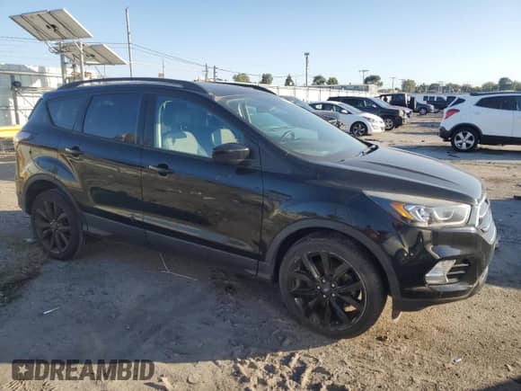 2017 Ford Escape SE с VIN 1FMCU9G98HUE31471, выставлен на аукционе Copart как лот 86806345 с пробегом Не указан миль и Чистый • Clean title. История ставок и продаж доступна на DreamBid. Изображение 4.
