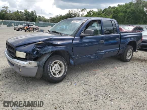 2001 Dodge Dakota Sport с VIN 1B7GL2ANX1S112824, выставлен на аукционе Copart как лот 59379065 с пробегом 315 361 миль миль и Списание • Salvage title. История ставок и продаж доступна на DreamBid. Изображение 1.