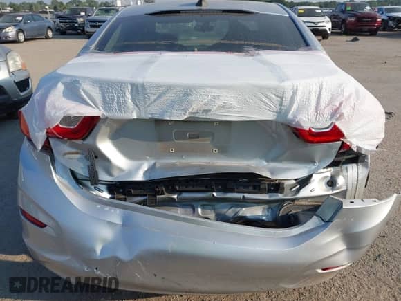 2018 Chevrolet Cruze LS z VIN 1G1BC5SM4J7196975, wystawiony jako IAAI lot #43259970 z przebiegiem 43 888 mil mil oraz . Historia ofert i sprzedaży dostępna na DreamBid. Obrazek 16.