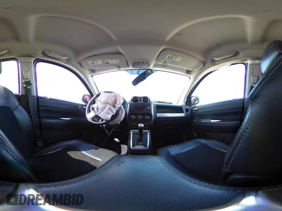 2014 Jeep Compass Latitude with VIN 1C4NJCEB4ED651713, listed as a IAAI auction lot 43305790 with 139,289 mi miles and . Bid and sale history available at DreamBid. Image 19.