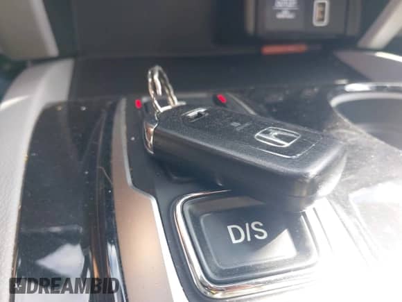 2022 Honda Pilot Touring 7-Passenger z VIN 5FNYF5H65NB001015, wystawiony jako IAAI lot #42523024 z przebiegiem 86 584 mil mil oraz . Historia ofert i sprzedaży dostępna na DreamBid. Obrazek 11.