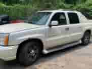 2004 Cadillac Escalade EXT with VIN 3GYEK62N94G182224, listed as a Copart auction lot 60896725 with 295,373 mi miles and Clean title. Bid and sale history available at DreamBid. Image 2.