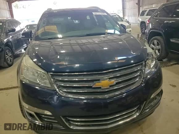 2015 Chevrolet Traverse LTZ с VIN 1GNKRJKDXFJ138627, выставлен на аукционе Copart как лот 67131835 с пробегом Не указан миль и Списание • Salvage title. История ставок и продаж доступна на DreamBid. Изображение 14.