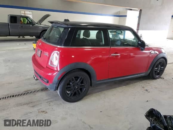 2013 MINI Hardtop S with VIN WMWSV3C5XDT392313, listed as a Copart auction lot 84942945 with 64,086 mi miles and Salvage title. Bid and sale history available at DreamBid. Image 3.