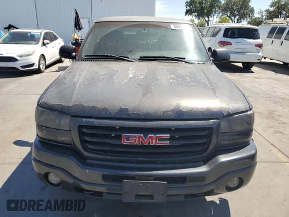 2003 GMC Sierra 1500 SLE with VIN 2GTEC19VX31143435, listed as a Copart auction lot 66678595 with 210,081 mi miles and Clean title. Bid and sale history available at DreamBid. Image 5.