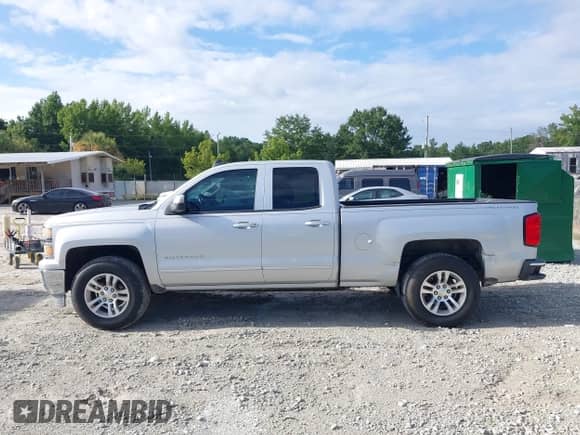 2015 Chevrolet Silverado 1500 LT z VIN 1GCRCREC4FZ380888, wystawiony jako IAAI lot #42831178 z przebiegiem 179 915 mil mil oraz . Historia ofert i sprzedaży dostępna na DreamBid. Obrazek 14.