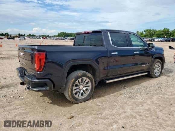 2023 GMC Sierra 1500 Denali z VIN 3GTUUGED9PG208796, wystawiony jako Copart lot #66319535 z przebiegiem 64 409 mil mil oraz Szkoda całkowita • Salvage title. Historia ofert i sprzedaży dostępna na DreamBid. Obrazek 3.