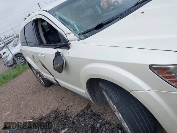 2013 Dodge Journey R/T z VIN 3C4PDCEG5DT642751, wystawiony jako IAAI lot #42306951 z przebiegiem 129 338 mil mil oraz . Historia ofert i sprzedaży dostępna na DreamBid. Obrazek 6.