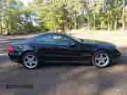 2003 Mercedes-Benz SL 500 with VIN WDBSK75F63F058929, listed as a IAAI auction lot 43288557 with 128,738 mi miles and . Bid and sale history available at DreamBid. Image 13.