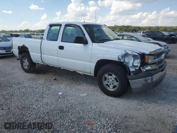2004 Chevrolet Silverado 1500 Work Truck with VIN 1GCEC19Z74Z276603, listed as a Copart auction lot 70582324 with 211,118 mi miles and Salvage title. Bid and sale history available at DreamBid. Image 4.