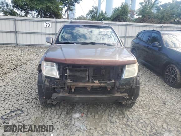 2006 Nissan Pathfinder LE z VIN 5N1AR18W76C681558, wystawiony jako Copart lot #72022875 z przebiegiem 176 899 mil mil oraz Szkoda całkowita • Salvage title. Historia ofert i sprzedaży dostępna na DreamBid. Obrazek 5.