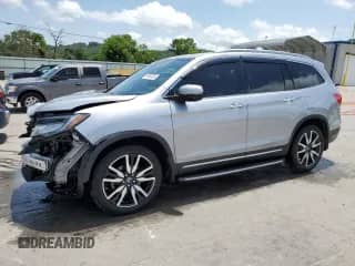2021 Honda Pilot Touring 8-Passenger с VIN 5FNYF6H9XMB060057, выставлен на аукционе Copart как лот 61585705 с пробегом 57 570 миль миль и Списание • Salvage title. История ставок и продаж доступна на DreamBid. Изображение 1.