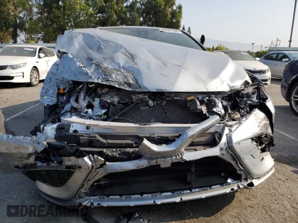 2023 Toyota Camry Hybrid SE with VIN 4T1G31AK6PU618210, listed as a Copart auction lot 64641305 with 21,685 mi miles and Salvage title. Bid and sale history available at DreamBid. Image 5.