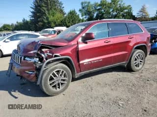 2020 Jeep Grand Cherokee Laredo E with VIN 1C4RJFAG7LC398457, listed as a Copart auction lot 70829065 with 52,734 mi miles and Salvage title. Bid and sale history available at DreamBid. Image 1.
