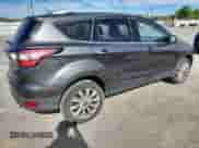 2017 Ford Escape Titanium с VIN 1FMCU9J9XHUE54596, выставлен на аукционе Copart как лот 84429485 с пробегом 110 079 миль миль и Списание • Salvage title. История ставок и продаж доступна на DreamBid. Изображение 3.