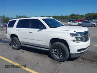 2015 Chevrolet Tahoe LS with VIN 1GNSCAEC3FR506698, listed as a IAAI auction lot 43316106 with 158,889 mi miles and . Bid and sale history available at DreamBid. Image 1.