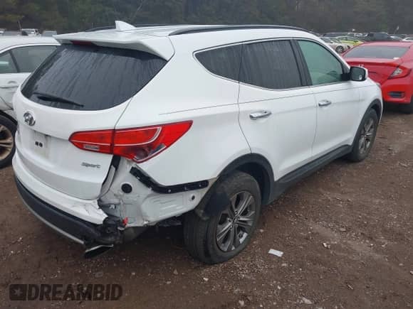2014 Hyundai Santa Fe с VIN 5XYZU3LB1EG135810, выставлен на аукционе IAAI как лот 43312775 с пробегом 99 730 миль миль и . История ставок и продаж доступна на DreamBid. Изображение 4.
