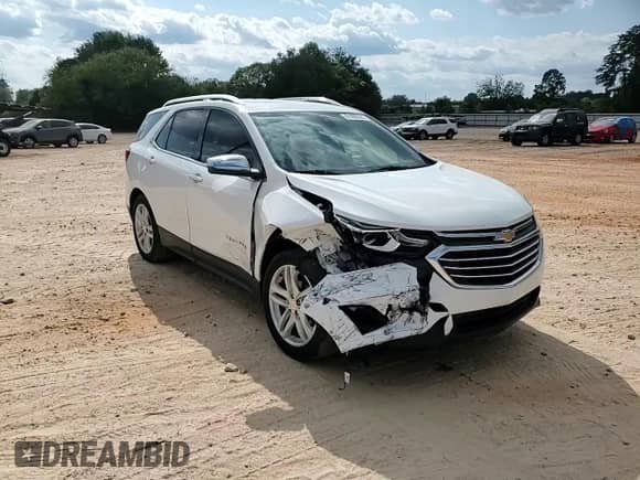 2020 Chevrolet Equinox Premier с VIN 3GNAXXEV2LS643113, выставлен на аукционе Copart как лот 81096505 с пробегом 72 316 миль миль и Списание • Salvage title. История ставок и продаж доступна на DreamBid. Изображение 14.