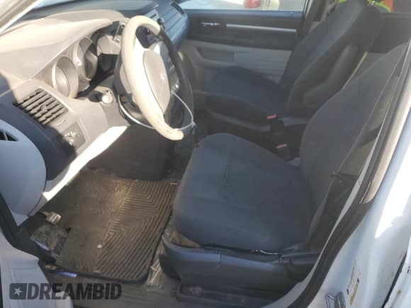 2010 Dodge Grand Caravan Cargo with VIN 2D4RN1AE3AR119390, listed as a Copart auction lot 84009314 with 63,871 mi miles and Salvage title. Bid and sale history available at DreamBid. Image 7.
