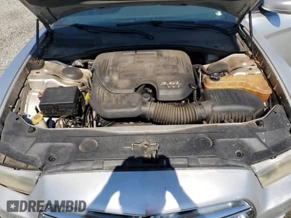 2012 Dodge Charger SE with VIN 2C3CDXBG4CH286718, listed as a Copart auction lot 84606735 with 167,618 mi miles and Salvage title. Bid and sale history available at DreamBid. Image 11.