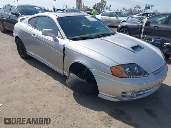 2003 Hyundai Tiburon GT с VIN KMHHN65F93U058914, выставлен на аукционе IAAI как лот 41583584 с пробегом 189 671 миль миль и . История ставок и продаж доступна на DreamBid. Изображение 1.