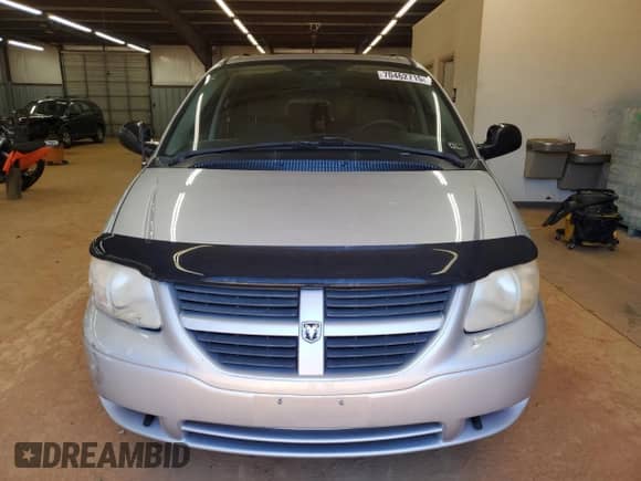 2006 Dodge Grand Caravan SE с VIN 1D4GP24R66B641197, выставлен на аукционе Copart как лот 70462715 с пробегом 140 763 миль миль и Списание • Salvage title. История ставок и продаж доступна на DreamBid. Изображение 5.