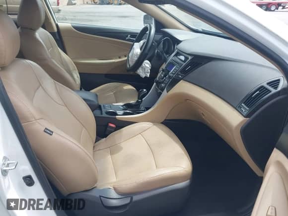 2013 Hyundai Sonata SE with VIN 5NPEC4AC0DH729220, listed as a IAAI auction lot 43095272 with 116,829 mi miles and . Bid and sale history available at DreamBid. Image 5.