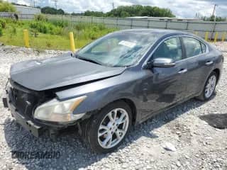 2012 Nissan Maxima SV с VIN 1N4AA5AP8CC821172, выставлен на аукционе Copart как лот 59743675 с пробегом 187 823 миль миль и Списание • Salvage title. История ставок и продаж доступна на DreamBid. Изображение 1.