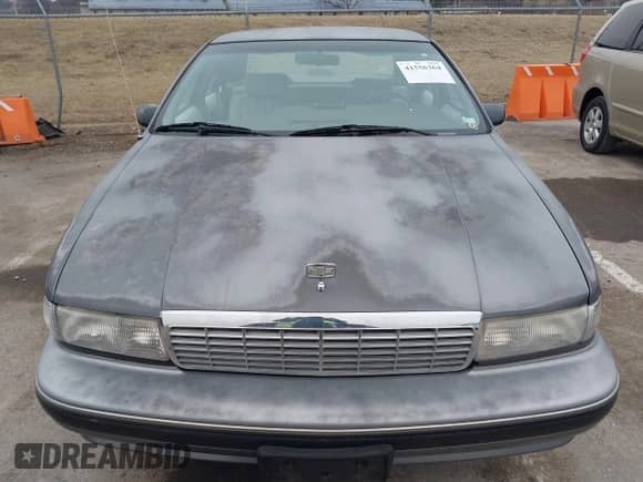 1991 Chevrolet Caprice z VIN 1G1BL53E8MW151443, wystawiony jako IAAI lot #41556364 z przebiegiem 136 440 mil mil oraz . Historia ofert i sprzedaży dostępna na DreamBid. Obrazek 12.