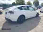 2023 Tesla Model Y Performance with VIN 7SAYGDEF0PF601457, listed as a IAAI auction lot 43361742 with Not provided miles and . Bid and sale history available at DreamBid. Image 4.