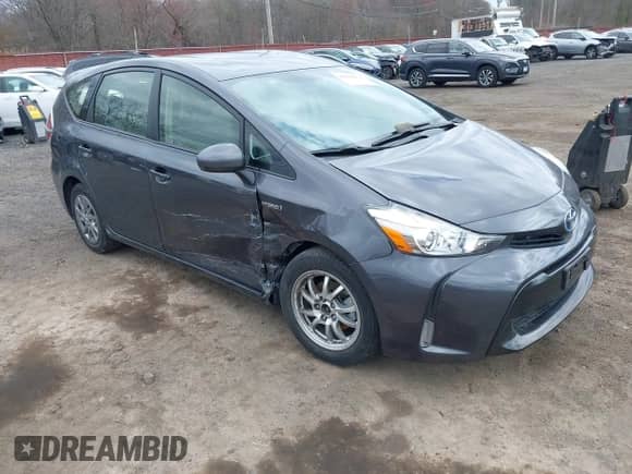 2015 Toyota Prius Two z VIN JTDZN3EU3FJ037486, wystawiony jako IAAI lot #42049071 z przebiegiem 18 509 mil mil oraz . Historia ofert i sprzedaży dostępna na DreamBid. Obrazek 1.