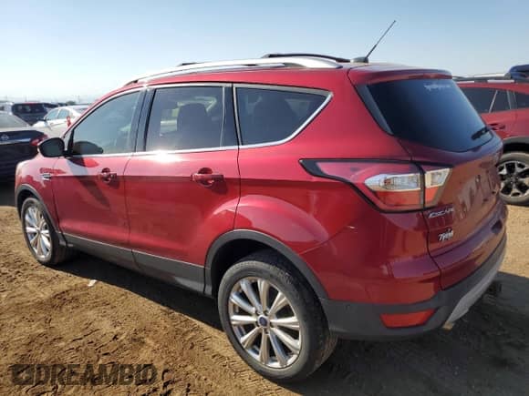 2017 Ford Escape Titanium with VIN 1FMCU9J90HUD53762, listed as a Copart auction lot 68472965 with 122,030 mi miles and Salvage title. Bid and sale history available at DreamBid. Image 2.