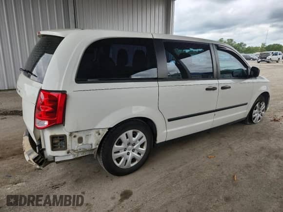 2013 Dodge Grand Caravan American Value with VIN 2C4RDGBG6DR765319, listed as a Copart auction lot 69782895 with 129,861 mi miles and Salvage title. Bid and sale history available at DreamBid. Image 3.