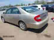 2002 Toyota Camry LE z VIN JTDBE32K320070184, wystawiony jako IAAI lot #42404821 z przebiegiem 252 580 mil mil oraz . Historia ofert i sprzedaży dostępna na DreamBid. Obrazek 3.