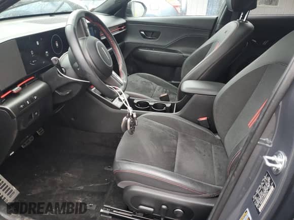 2024 Hyundai Kona N Line с VIN KM8HACA31RU066276, выставлен на аукционе Copart как лот 69594645 с пробегом 12 793 миль миль и Списание • Salvage title. История ставок и продаж доступна на DreamBid. Изображение 7.